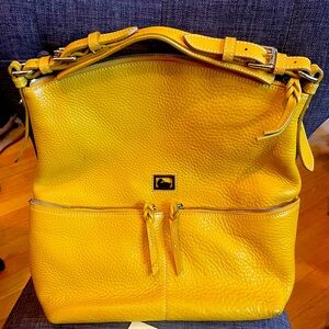 Dooney & Burke bag authentic with original registration numbers and price tag